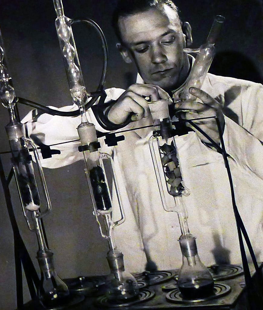 Laboratory oil extraction from upper leather for an advertising book for C&J Clark Ltd (Clarks Shoes), 1940 Laboratory oil extraction from upper leather for an advertising book for C&J Clark Ltd (Clarks Shoes), 1940